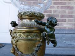 Louis 16 style Centerpiece whit putto,s signed by Provost in gilded and patinated bronze whit crystal, France 1880