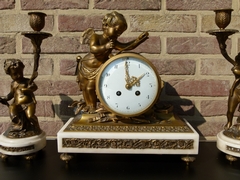 Louis 16 style Clockset with cherub in gilded bronze and white marblee, France 1890