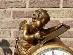 Louis 16 style Clockset with cherub in gilded bronze and white marblee, France 1890