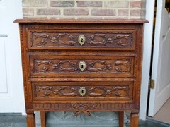 Louis 16 style Small chest of drawers in carved oak, Belgium 1900