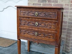 Louis 16 style Small chest of drawers in carved oak, Belgium 1900