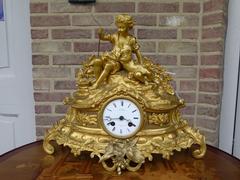 Louis Philippe style Gilded clock in bronze and spelter, France 1870