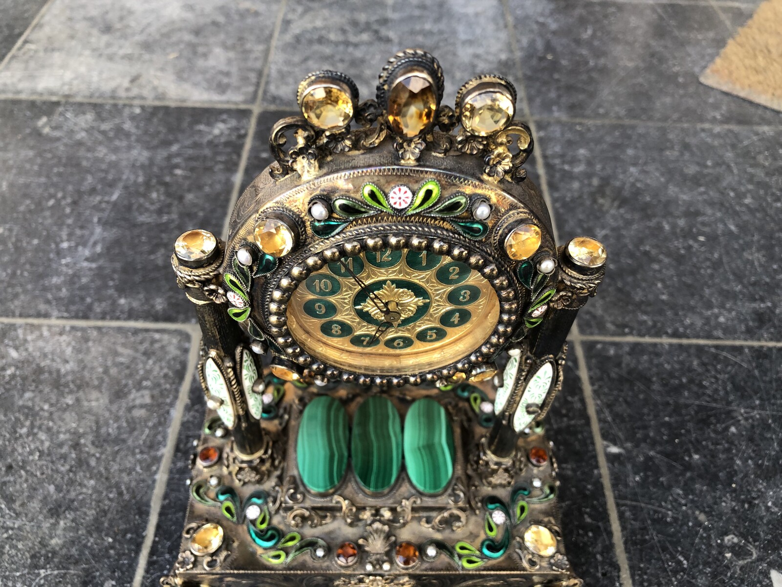 Miniature clock with musical box and precious stones, enamel