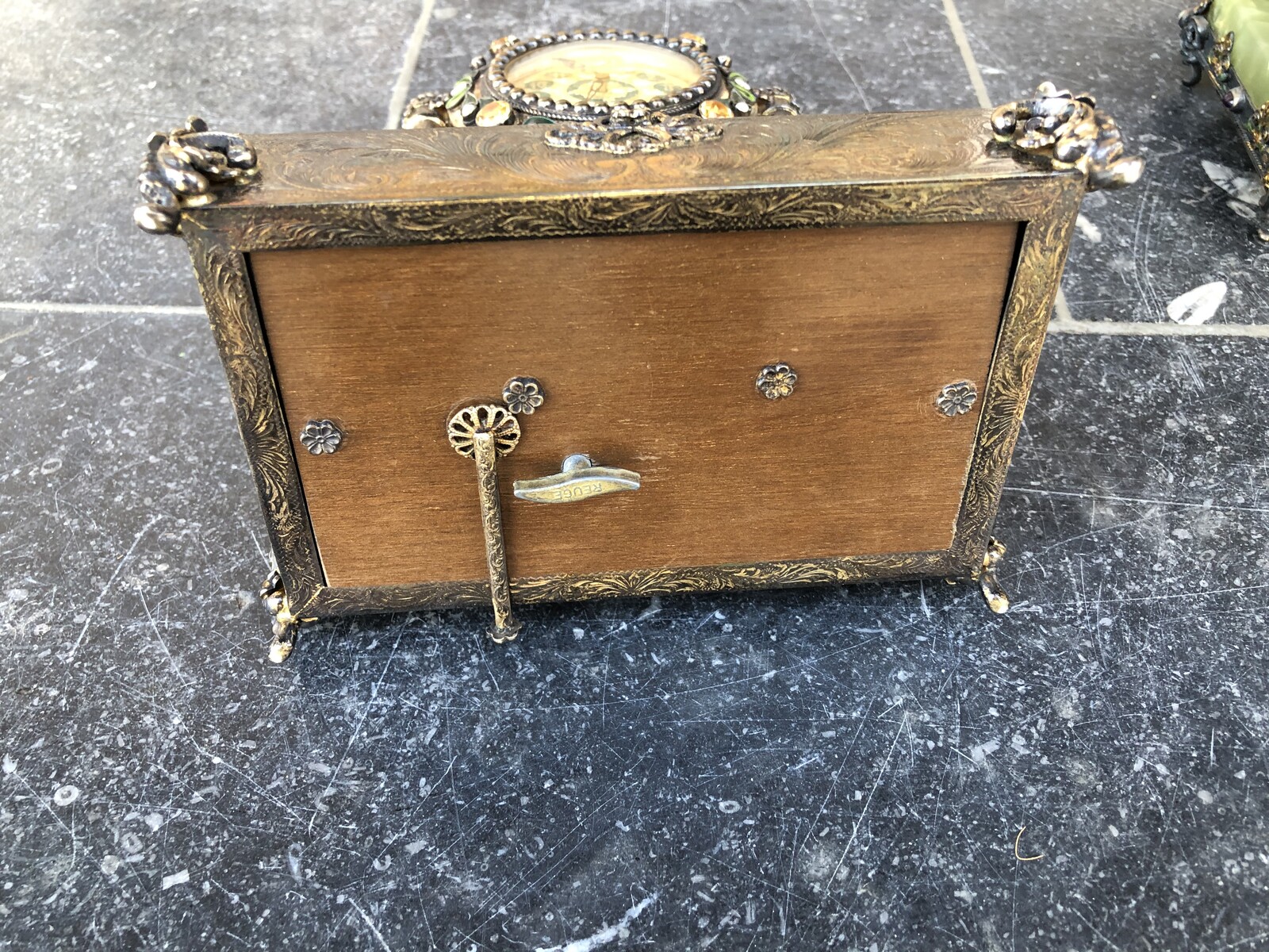 Miniature clock with musical box and precious stones, enamel