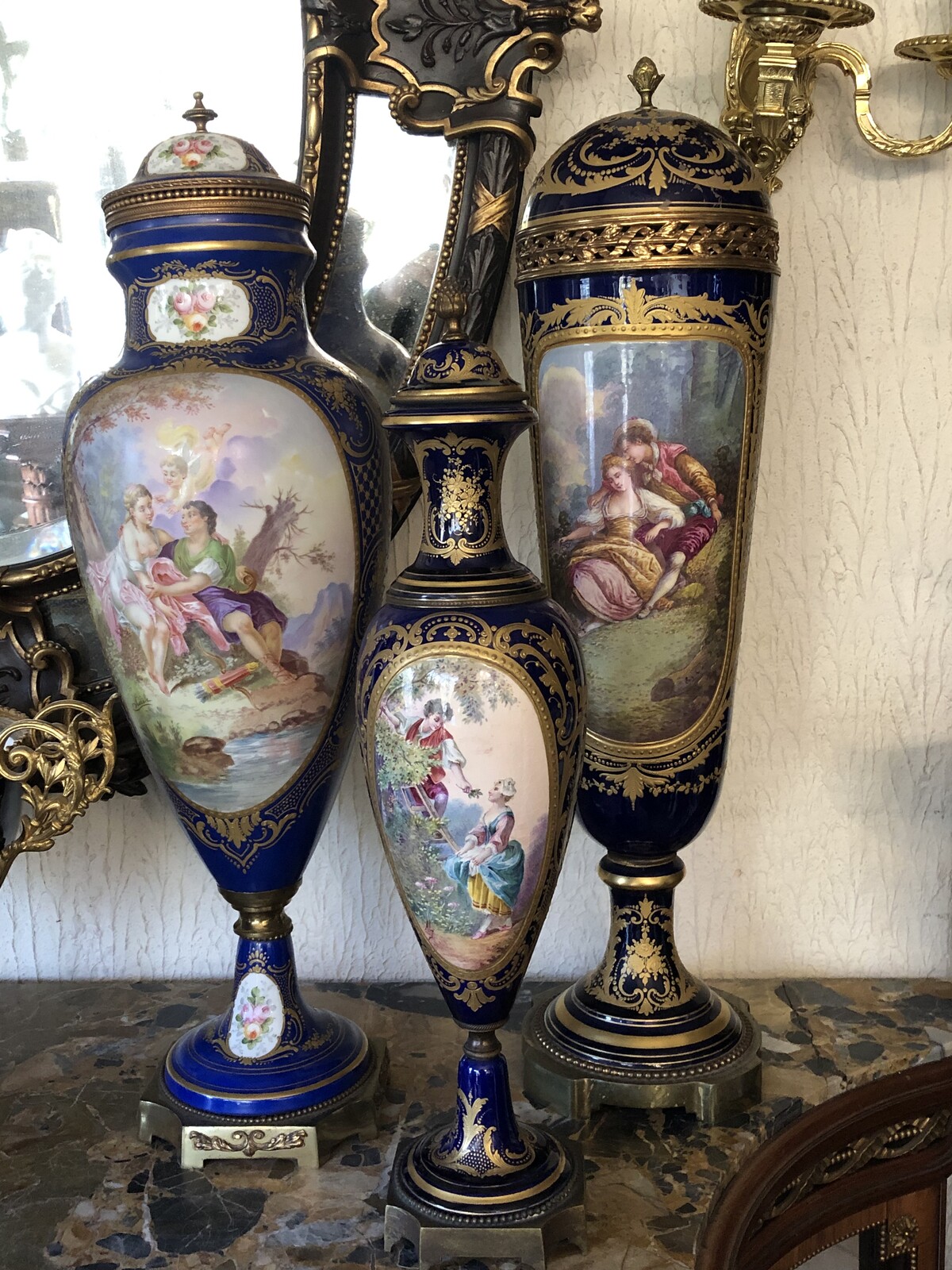 Napoleon III 3 pairs of vases 56cm till 72cm and one centerpiece