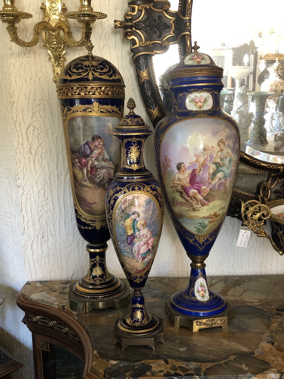 Napoleon III 3 pairs of vases 56cm till 72cm and one centerpiece