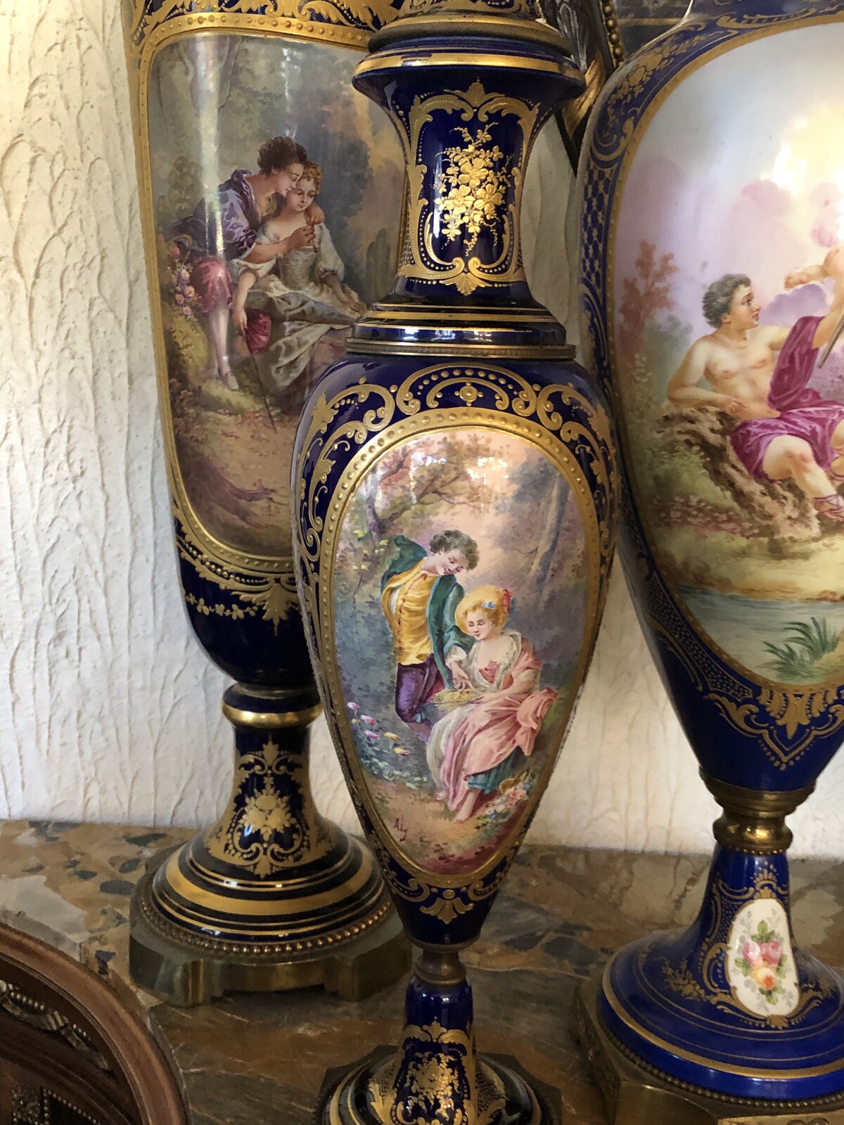 Napoleon III 3 pairs of vases 56cm till 72cm and one centerpiece