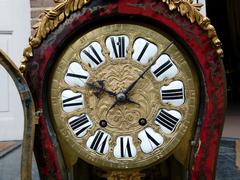 Napoleon III style Cartel with turtoiseshell inlay in gilded bronze and Boulle marquetry, France 1880