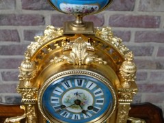 Napoleon III style Clock pendule with Sévres porcelain in gilded bronze, France 1880