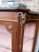 Napoleon III style Display cabinet with curved glass in gilded bronze and mahogany, France 1880