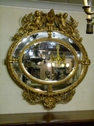 Napoleon III style Huge gilded oval mirror with putto,s, France 1880