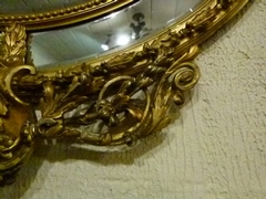 Napoleon III style Huge gilded oval mirror with putto,s, France 1880