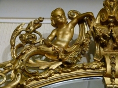 Napoleon III style Huge gilded oval mirror with putto,s, France 1880