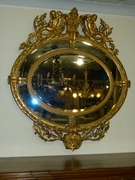 Napoleon III style Huge gilded oval mirror with putto,s, France 1880