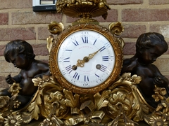 Napoleon III - Louis 16 style Huge clock with putto,s by Boursier,eléve de Lepaute à Paris in gilded and patinated bronze , France 1880