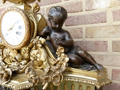 Napoleon III - Louis 16 style Huge clock with putto,s by Boursier,eléve de Lepaute à Paris in gilded and patinated bronze , France 1880