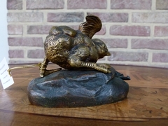 Napoleon III style Sculpture by C.Masson of a young bird playind with a snail in two colours patinated bronze, France 1880