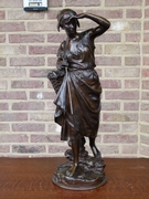 Napoleon III style Sculpture by Eugéne Laurent 1832-1898 of a lady what,s coming back from the sea on red marble base in patinated bronze, France 1880