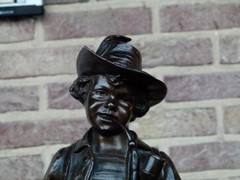 Napoleon III style Sculpture of a pipe smoking boy signed by Melane in patinated bronze, France 1880