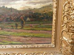 style Painting of a landscape of a small village in oil on canvas in a gilded frame, Belgium 1900