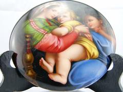 style painting on porcelain plate of a mother with child in porcelain 1880