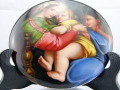 style painting on porcelain plate of a mother with child in porcelain 1880