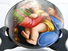 style painting on porcelain plate of a mother with child in porcelain 1880