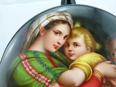 style painting on porcelain plate of a mother with child in porcelain 1880