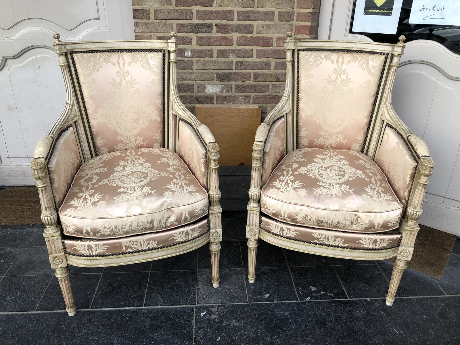 pair patinated armchairs