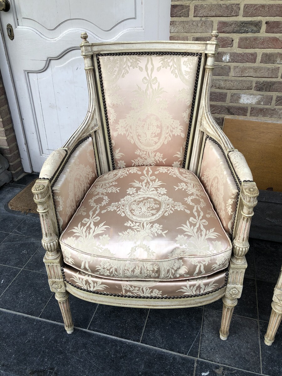 pair patinated armchairs