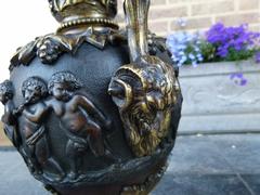 Paire vases with cherubs in patinated bronze, France 1880