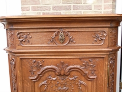 Regénce style One-door cabinet signed by Nullens J.  in carved oak, Belgium,Liége 1950