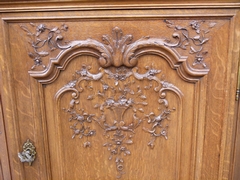 Regénce style One-door cabinet signed by Nullens J.  in carved oak, Belgium,Liége 1950