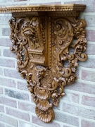 Renaisence style Wall console in carved oak, Belgium 1930