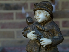 style Sculpture by G.Omert child with doll in gilded bronze and ivory, France 1890