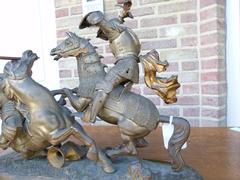 style Sculpture of a battle of two warriors in patinated bronze, France 1880