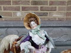 sculpture of a lady in a carriage in porcelain, Germany 1940