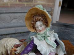 sculpture of a lady in a carriage in porcelain, Germany 1940