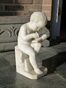 style Sculpture of a young boy write a book in carved alabaster, Italy 1900