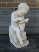 style Sculpture of a young boy write a book in carved alabaster, Italy 1900