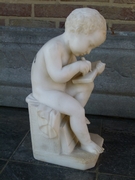 style Sculpture of a young boy write a book in carved alabaster, Italy 1900