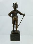 style Sculpture of a young smoking boy in bronze on marble base, France 1920