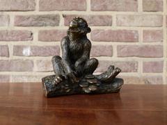 Signed with a V.1902 style Miniature bronze sculpture of a monkey in patinated bronze 1900