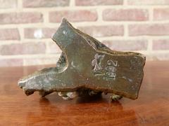 Signed with a V.1902 style Miniature bronze sculpture of a monkey in patinated bronze 1900