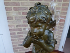 style Sulpture by Auguste Moreau of a winged putto giving hand kisses in patinated bronze, France 1880